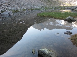 The reflection of Malh des Puis, the north end of the ridge leading to Tuc de Mulleres